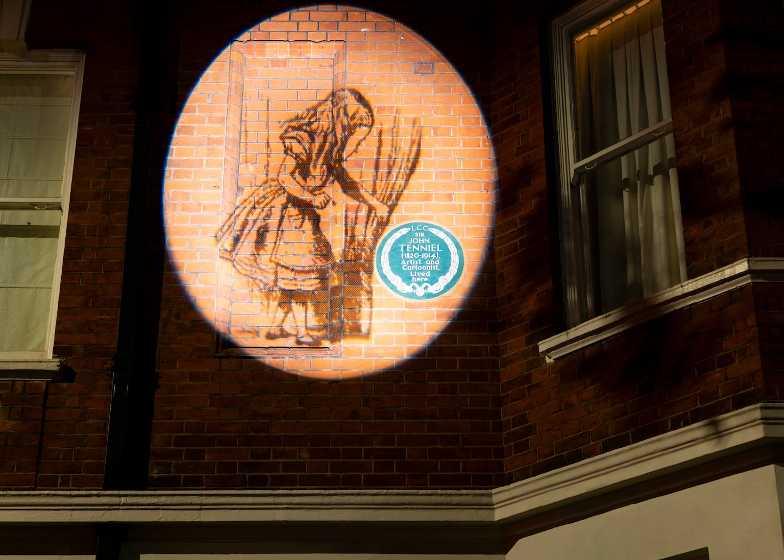 Plaque for Alice In Wonderland illustrator reinstalled after 65 years in storage