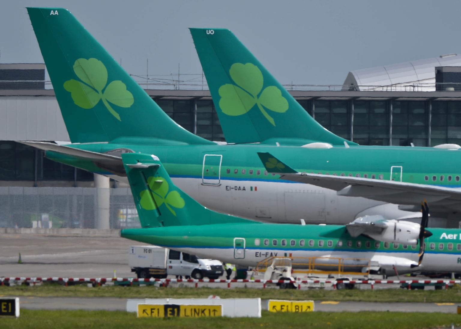 Shares in Aer Lingus and British Airways’ owner IAG drop 10% after fall in US demand