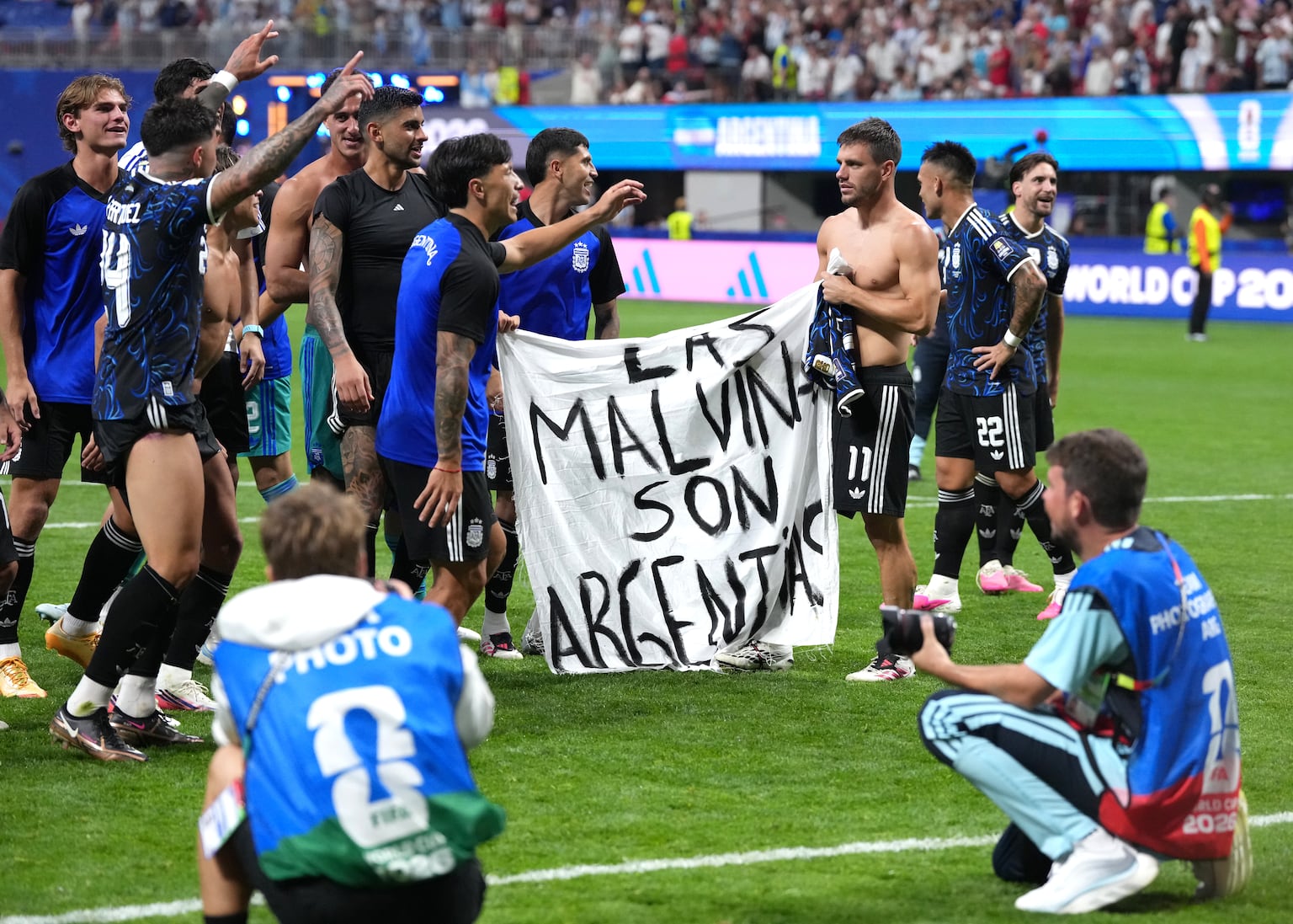 Argentina players hold up Falklands Islands banner after World Cup semi-final