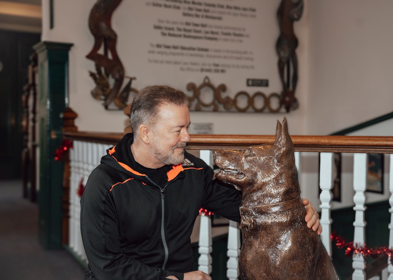 Comedian Ricky Gervais unveils statue paying tribute to dog from After Life