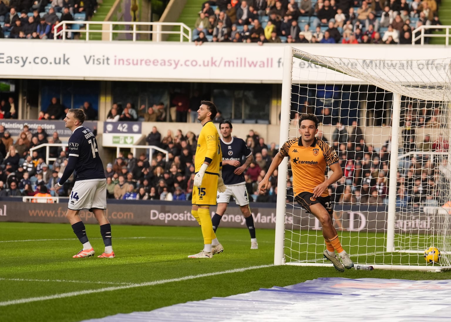 Kyle Joseph brace keeps Hull in play-off places after victory at 10-man Millwall