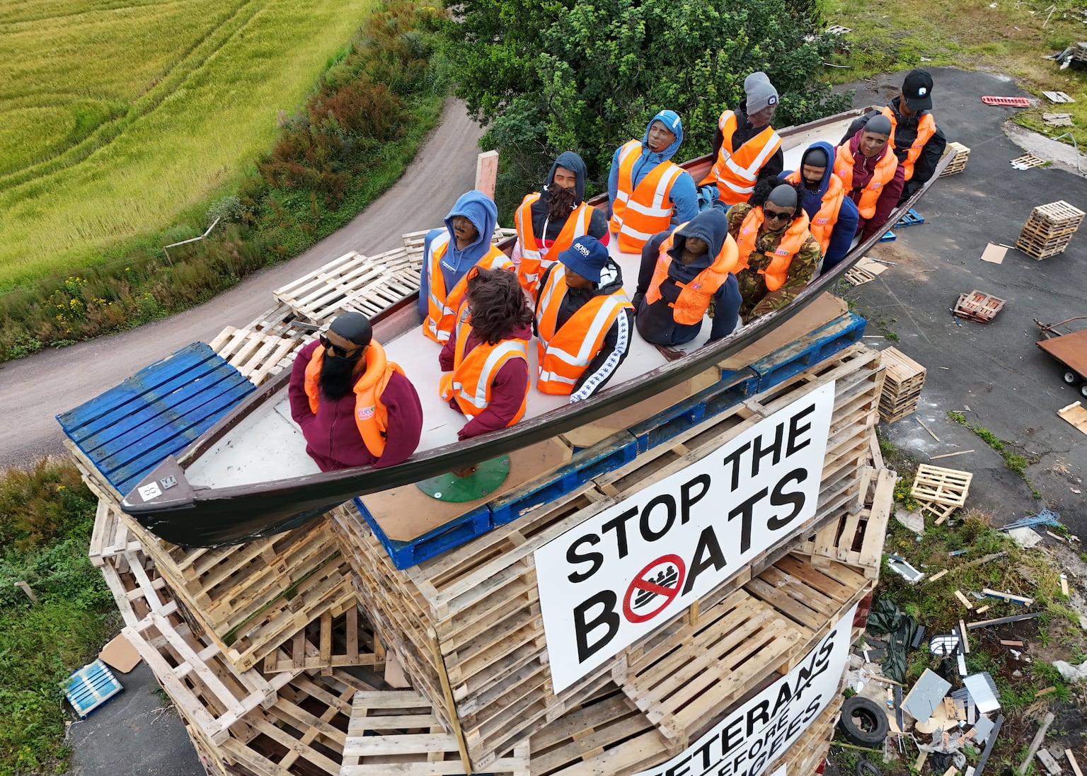 A boat with effigies of migrants on top of a bonfire in Moygashel Co Tyrone. 